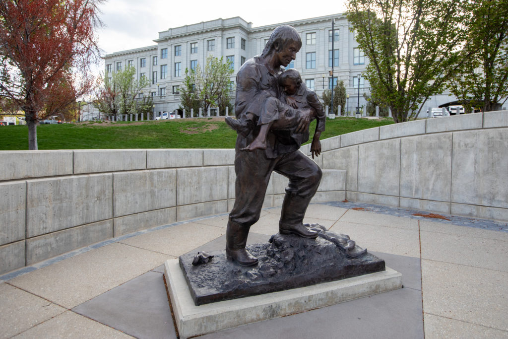 Utah Law Enforcement Memorial bronze statue of man with child