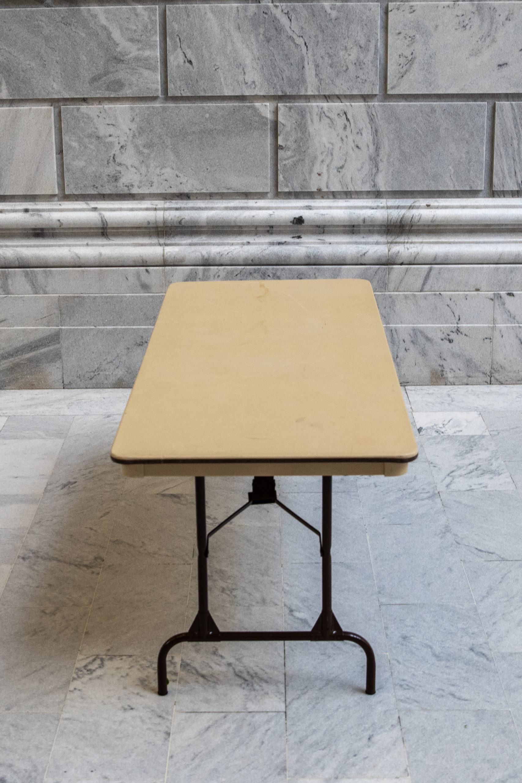 6' Rectangular Banquet Table on marble backdrop