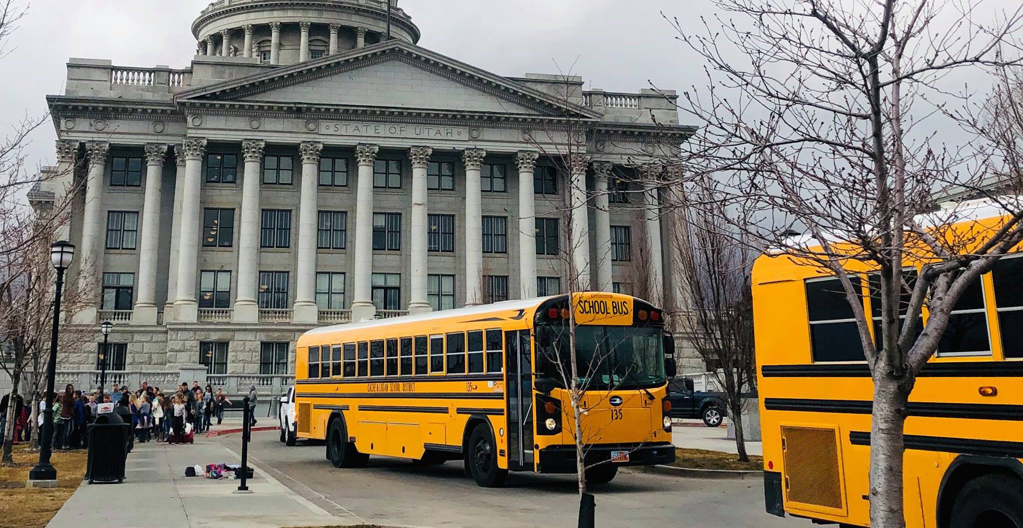 School busses parked outside the Utah State Capitol