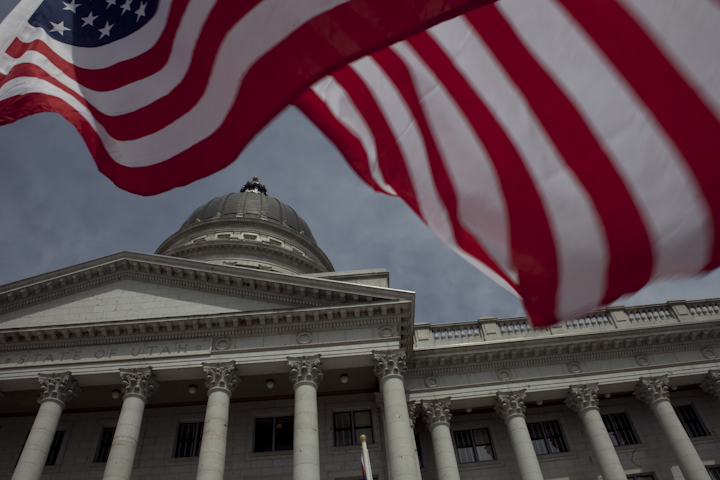 U.S. flag flying in front of the Utah State Capitol. Utah State Capitol image.