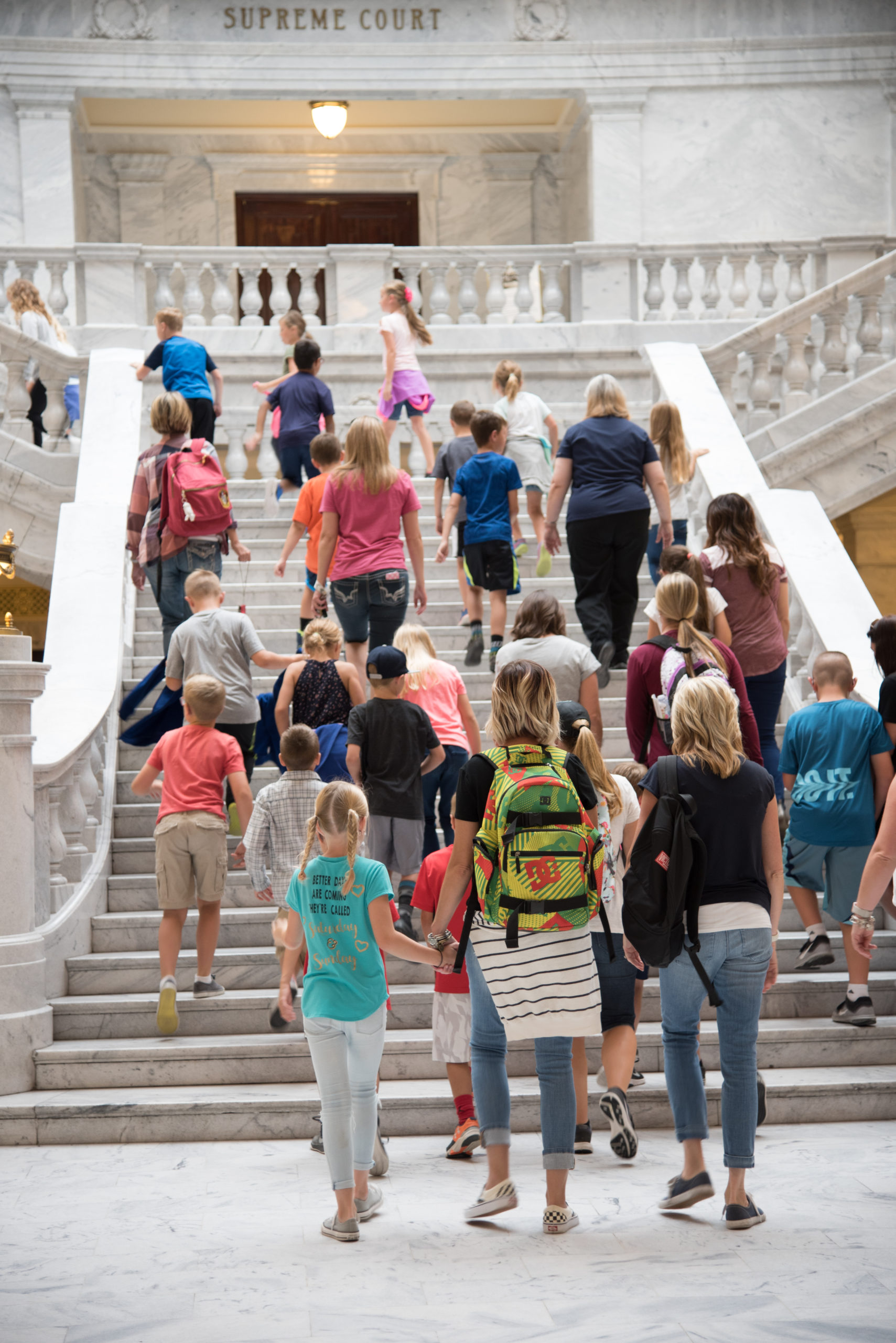 Group of school age children on a guided tour of the Utah State Capitol Rotunda.